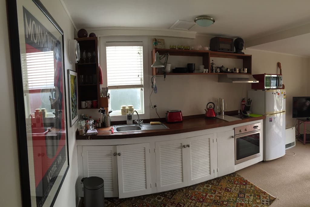 Kitchen, Preparation Area, Sink, Stove Top, Microwave.