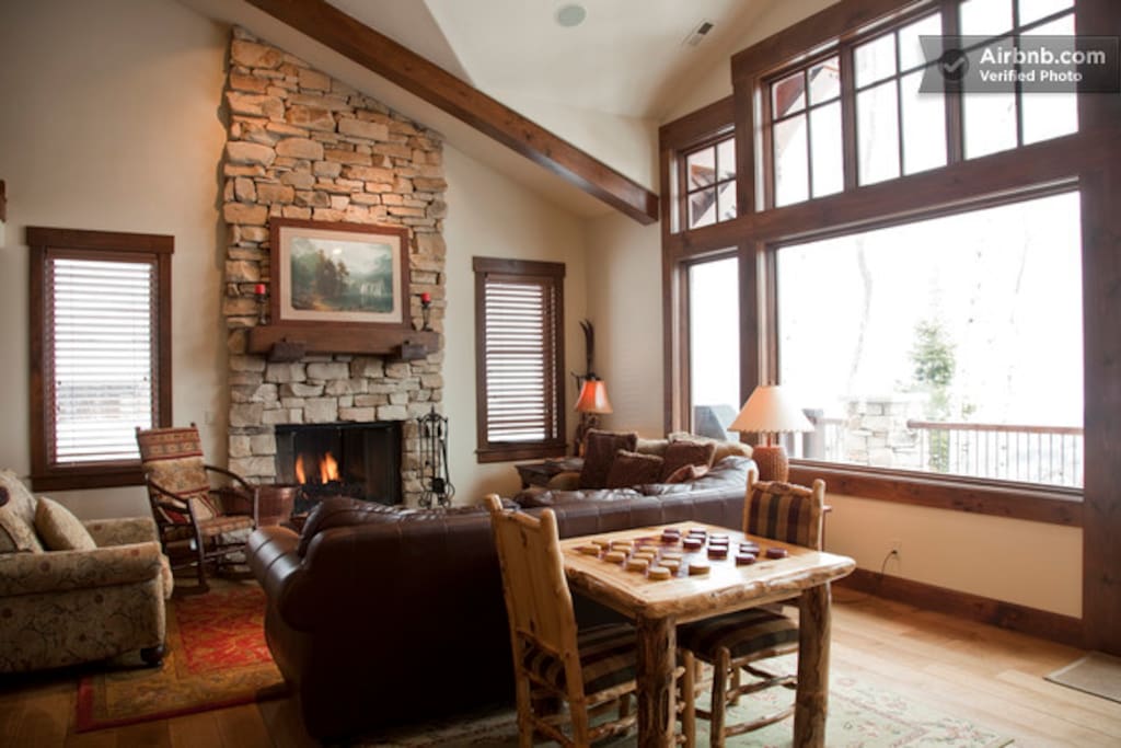 Large great room with fireplace and vaulted ceiling