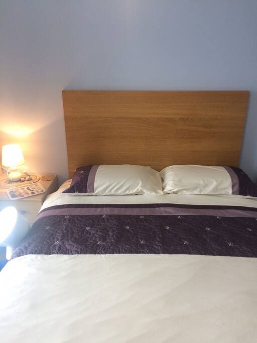 Large double bed with cozy deep ortho mattress