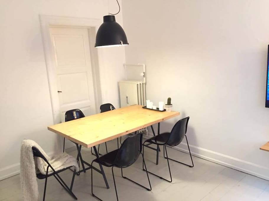 Living room. Big dining table and 5 chairs