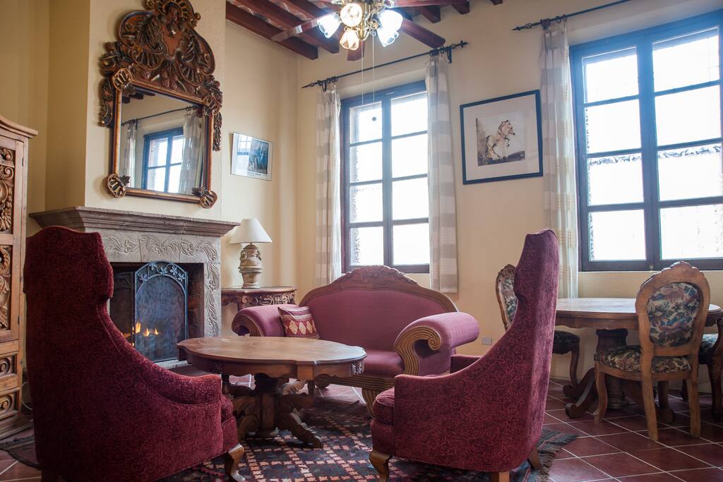 Living Room with fireplace and dining table