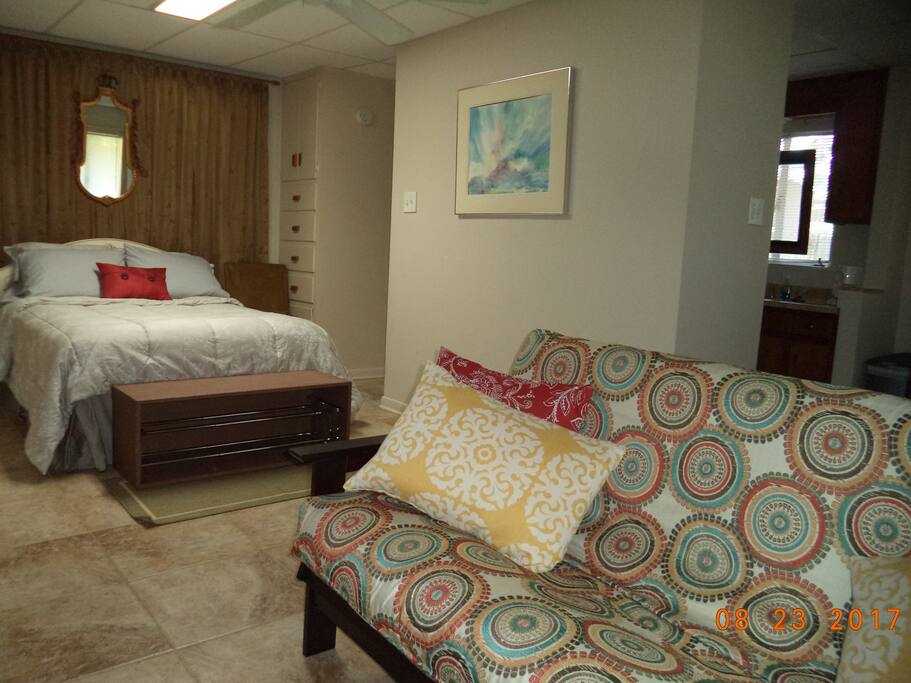Comfortable and quiet the studio apartment has a double bed and a futon.
