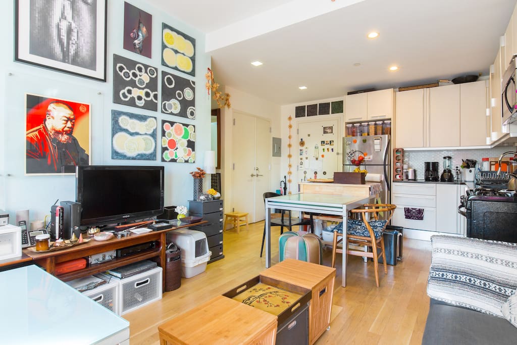 Modern living room, full of art.