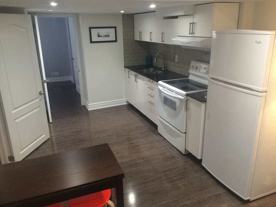 Kitchen with table that expands to seat 4