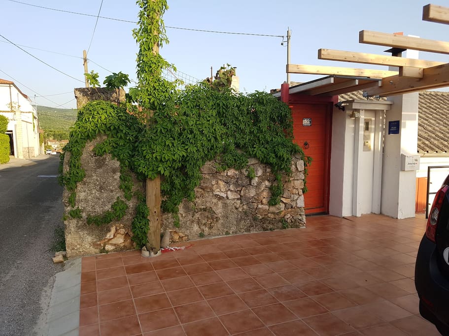 parking area and entrance to the upper terrace