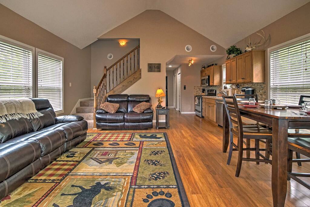 Enter the home into an open-concept layout where you'll find modern appliances and high-end furnishings.