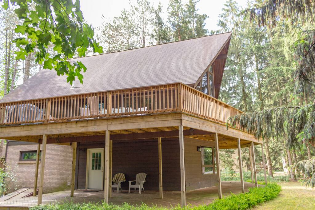 Top and bottom decks, wrap around two sides of house