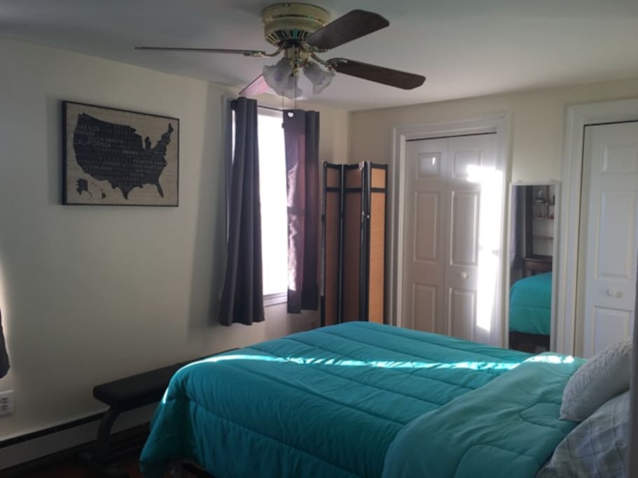 Spacious Bedroom with Closet and Ceiling Fan