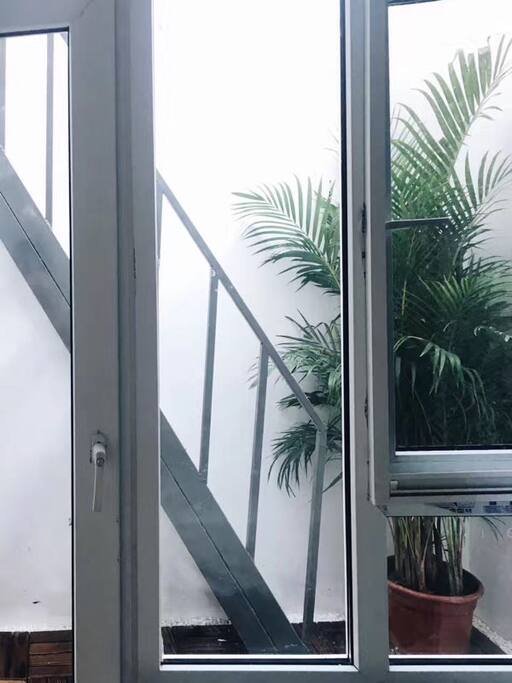 Stairs to balcony outside the bedroom