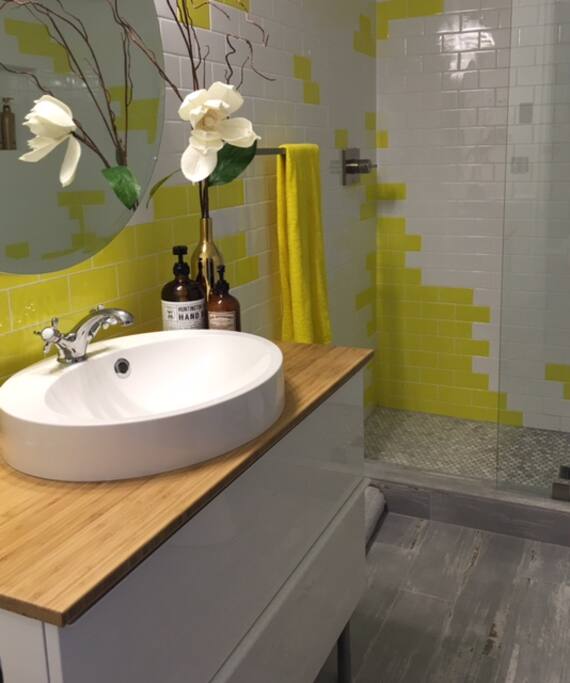 Main bathroom upgraded with doorless walk-in rain-shower