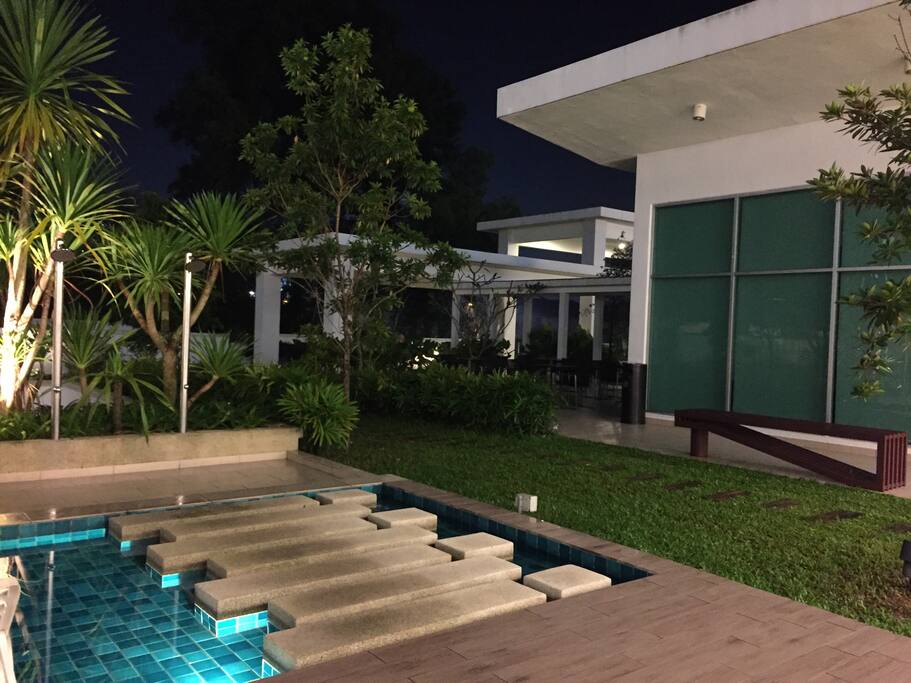 The barbecue and garden area. Overseeing the swimming pool.