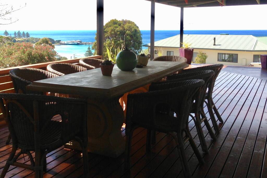 Covered outdoor dining with ocean views.