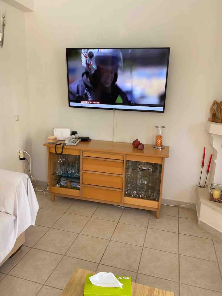 50" Wall Mounted Smart TV with Streaming box 