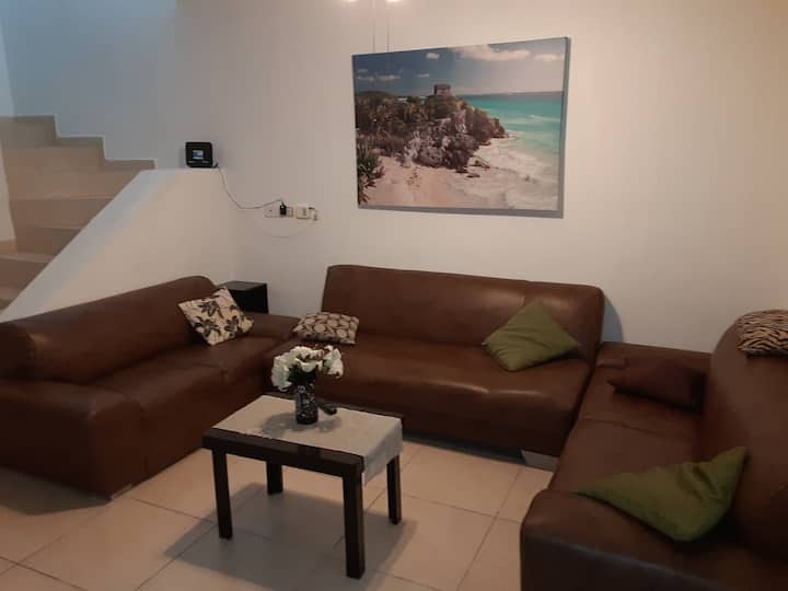 Living Room with Futon that becomes a double size bed. 
Living Room with full size futon.