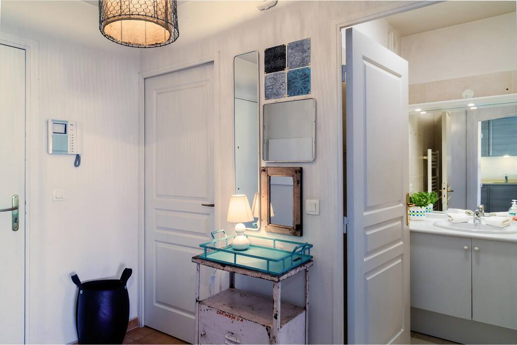 Hallway towards bathroom and separate toilet