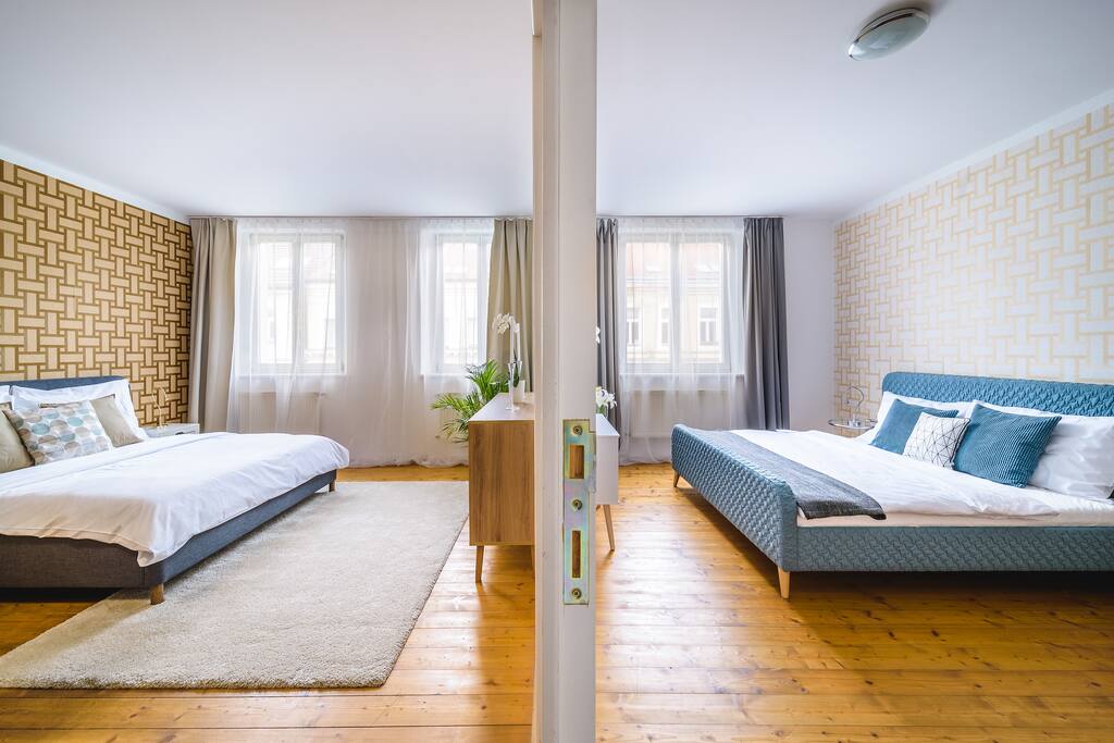 On the left you can see the 1st bedroom connected with dining room. On the right a separate 2nd bedroom