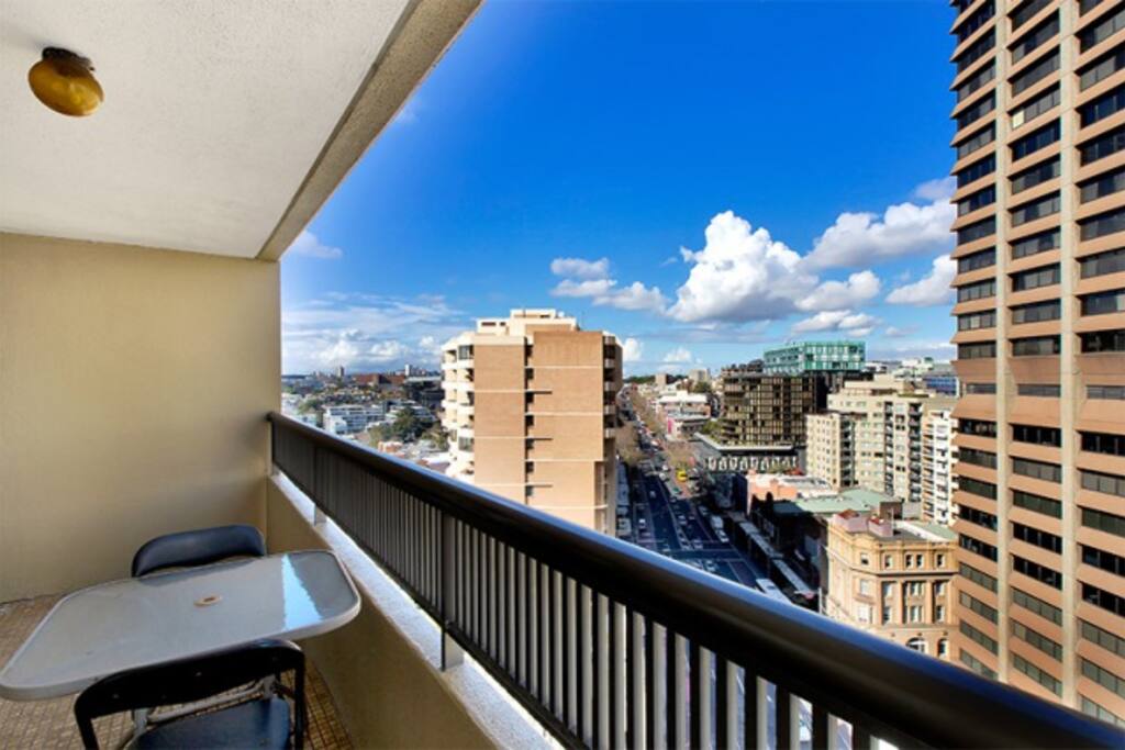 Large balcony with city views.