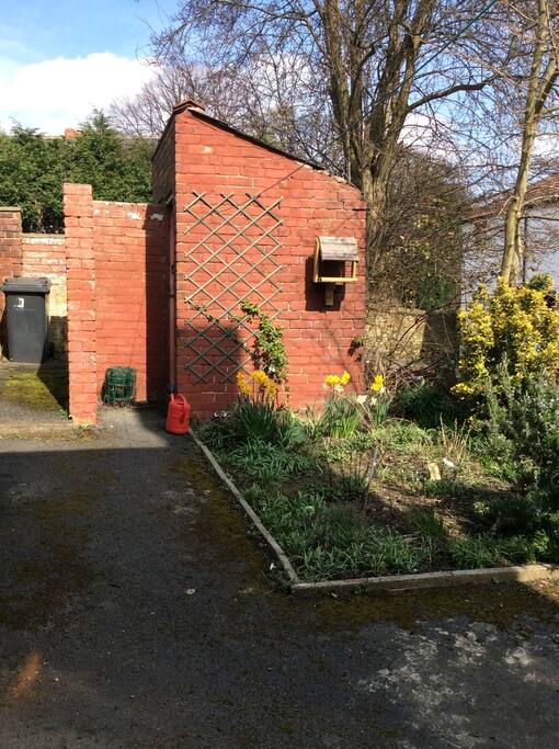 Quiet private yard with small garden.