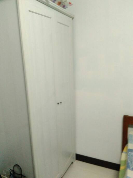 Wardrobe next to the bed
