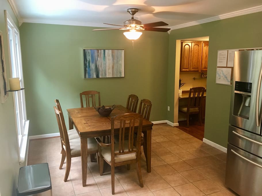 Large seating for up to 8 people (leaf and extra chairs in closet). Also, there is a great view of the woods and backyard.