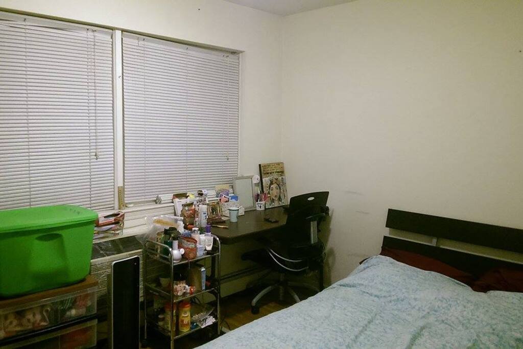 Fully furnished with a double bed, working table and chair, a wall mirror, a wardrobe with hanger and a bookshelf, floor is hard wood floor.