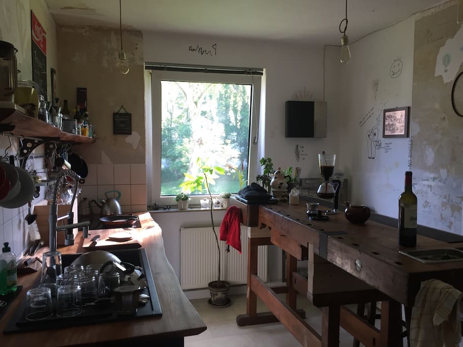 another view in to the kitchen with the window to the garden / backyard of the house