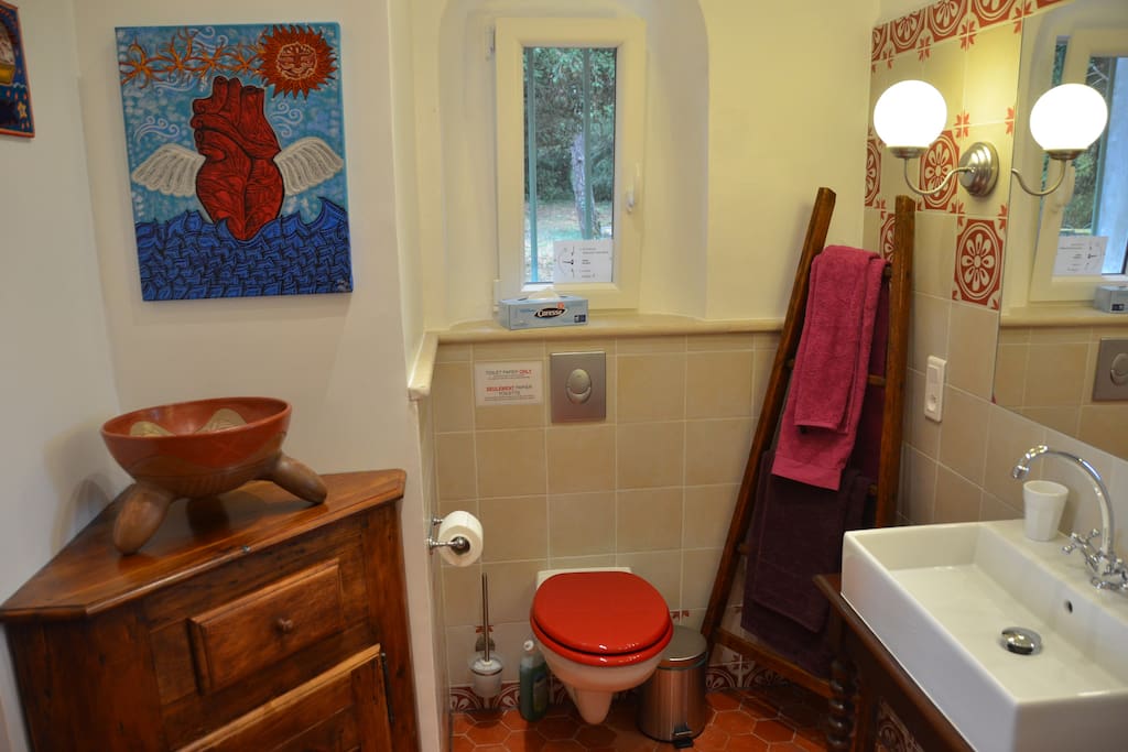 The ensuite bathroom includes bathtub with views