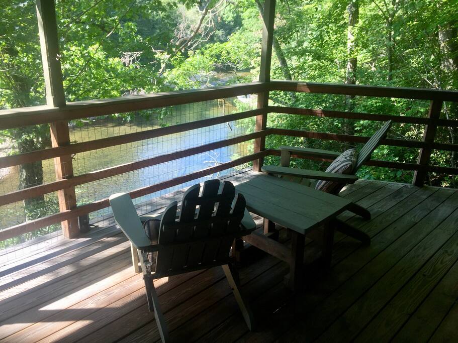 Nice place to have coffee or cocktails, just off of living area in the Main cabin. The porch has fencing to keep small children and pets safe.