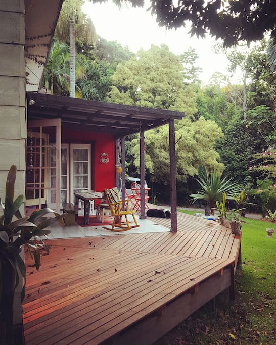 Wrap around deck to lap up sun or shade at any time of the day. Big french doors for that outside/inside feel.