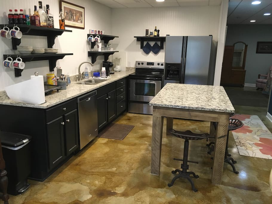 Kitchen area includes refrigerator w/icemaker, stove, dishwasher, and microwave.