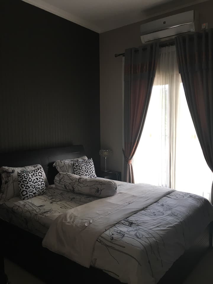 Silver Room. Great Design Comfy Queen Bed, Full Wallpaper with 2 doors wardrobe with Set of Make up Table. Full AC ( Aircond ) 