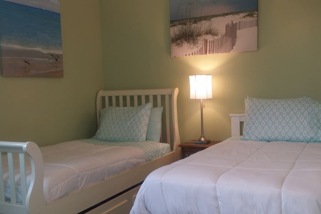 Twin Beds in a large bedroom