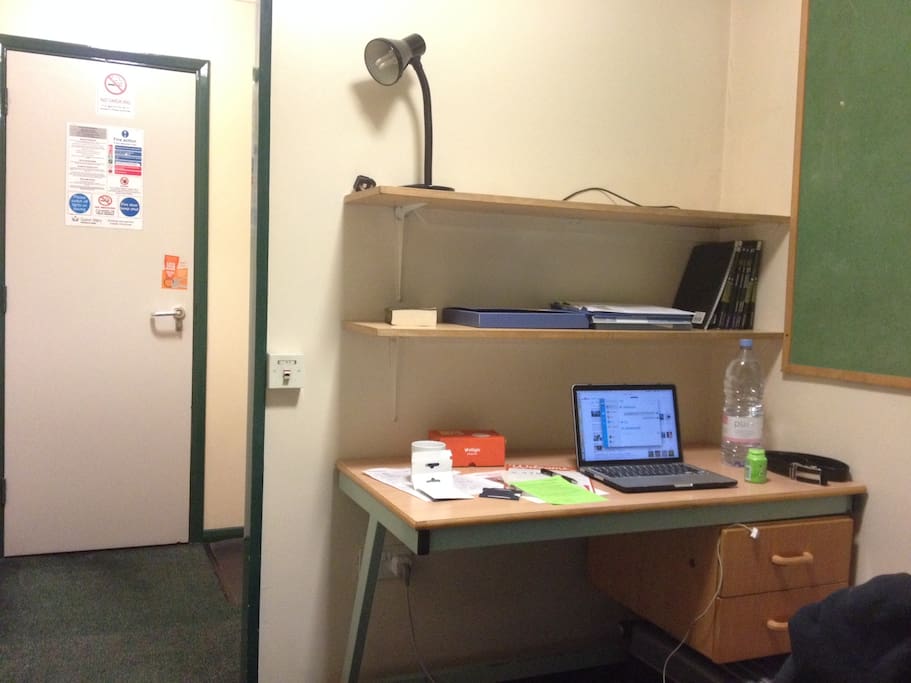 There are desk and chair inside the room.