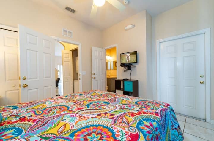 Island Escape Suite
Relax in this colorful island-themed queen bedroom with a private master bath. Bright, breezy, and perfect for a tropical getaway!