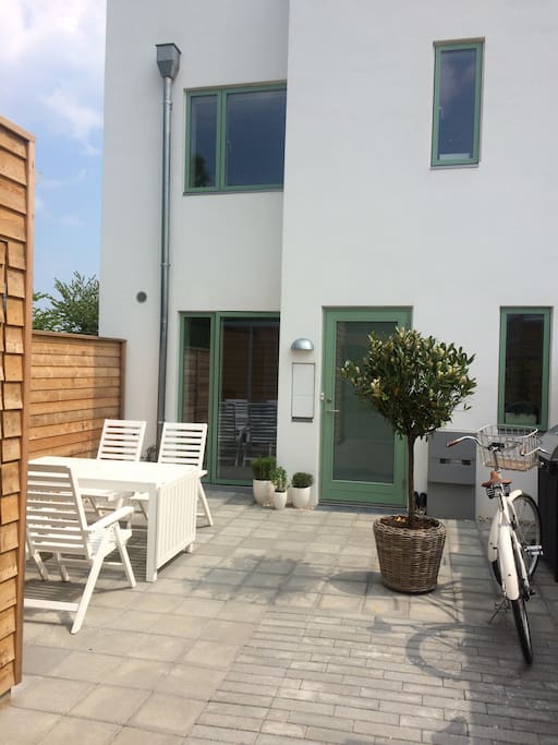 Entrance to the house. Sun on the terasse from 1 pm until late evening. Table can be extended to 8 people