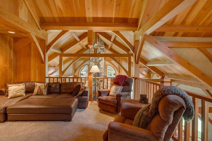 Upstairs living room with queen futon, reclining chairs and TV lounge.
