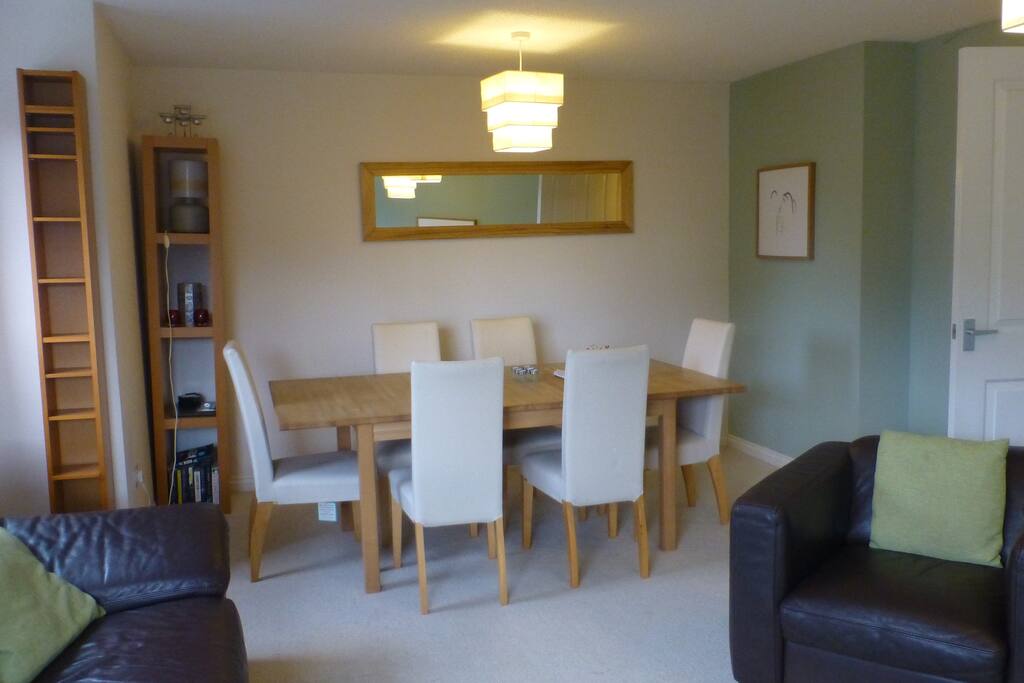 Lounge with very comfy, large leather sofa, chair and dinning table for 6.