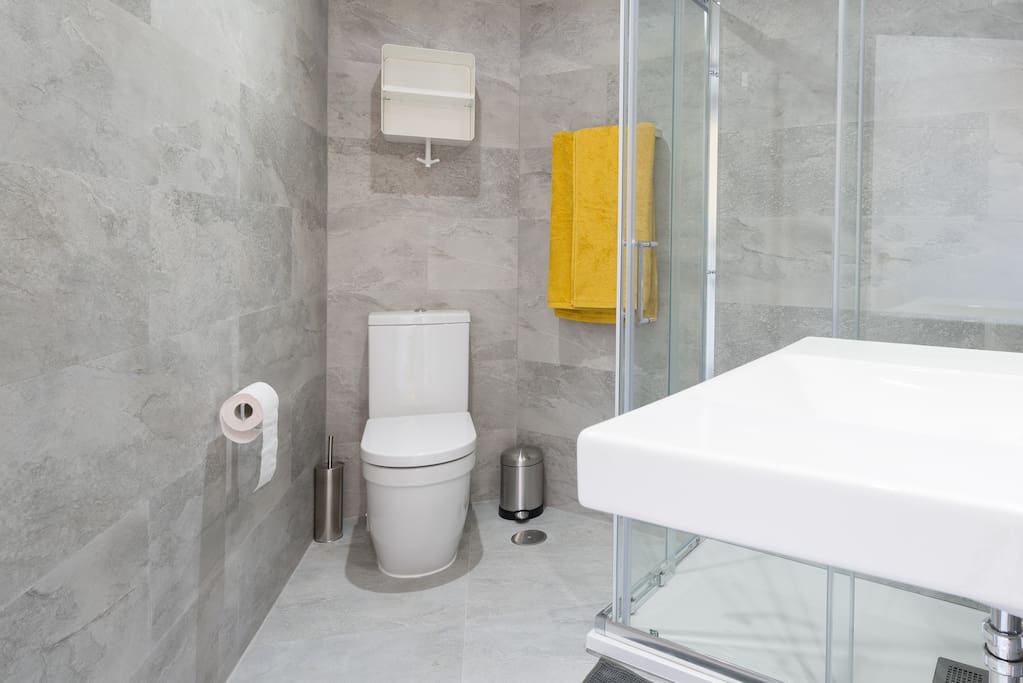 Modern bathroom. Towels are provided during your stay