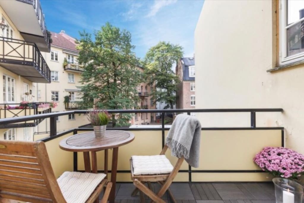 The balcony overlooks the courtyard, and is a great breakfast spot.