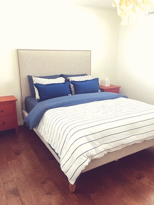 New queen-sized West Elm bed with new 14” memory foam mattress and all-new bedding