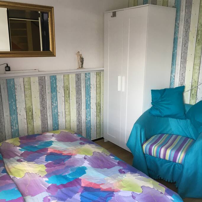 Wardrobe and easy chair