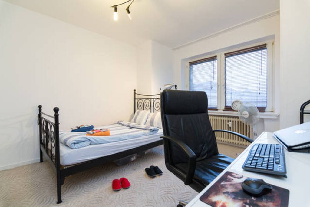 Bedroom with double bed and working space