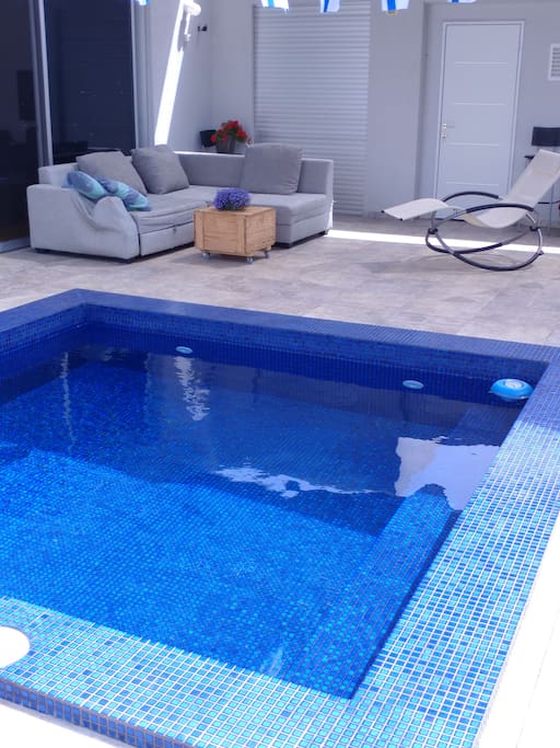 The swimming pool is 3 steps of the room