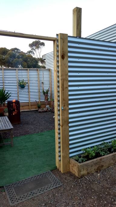 Private courtyard and entrance to cosy self contained cabin
