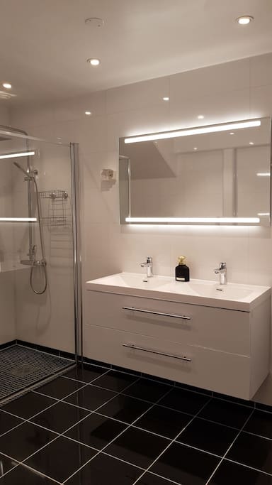 Bright bathroom with double sink.