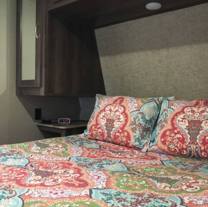 Queen-size master bed.