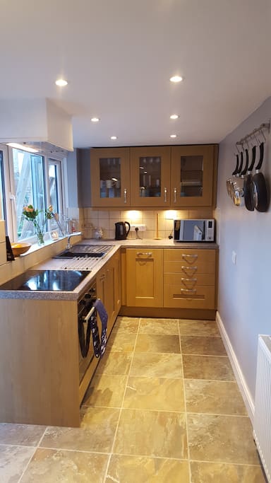 The kitchen is well equipped to serve meals for 8 people
