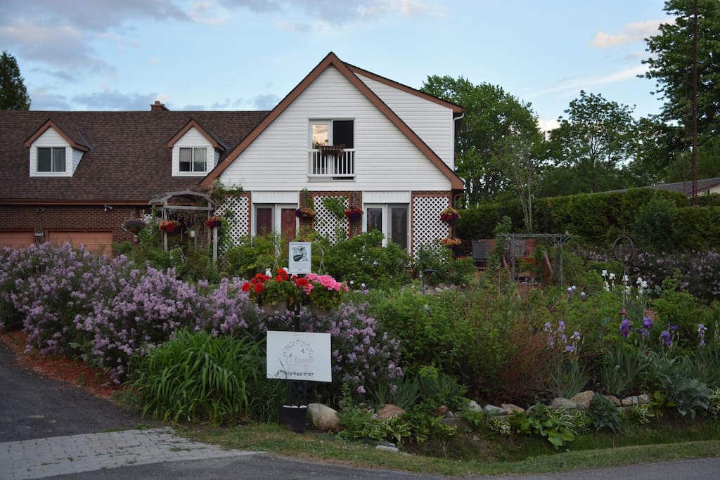Enjoy the changing seasons in the gardens, shown here featuring June's lilacs.