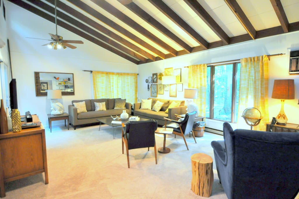The open living space with lofty ceilings offer a comfortable, homey feel.