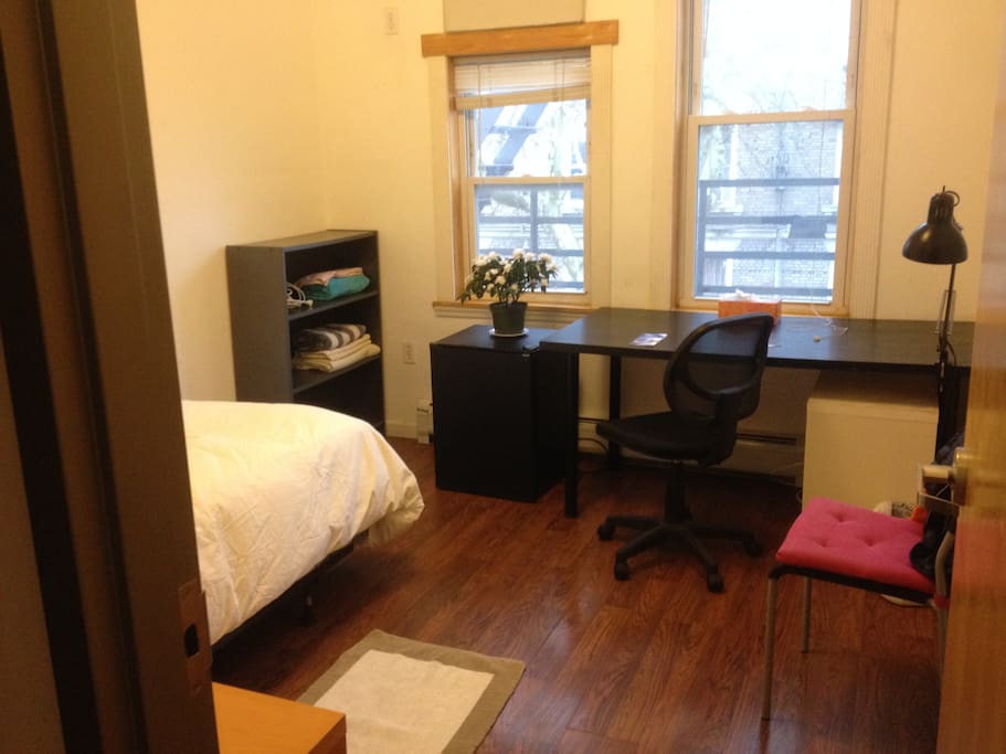 2 huge windows with southern exposure and a built in air conditioning unit.